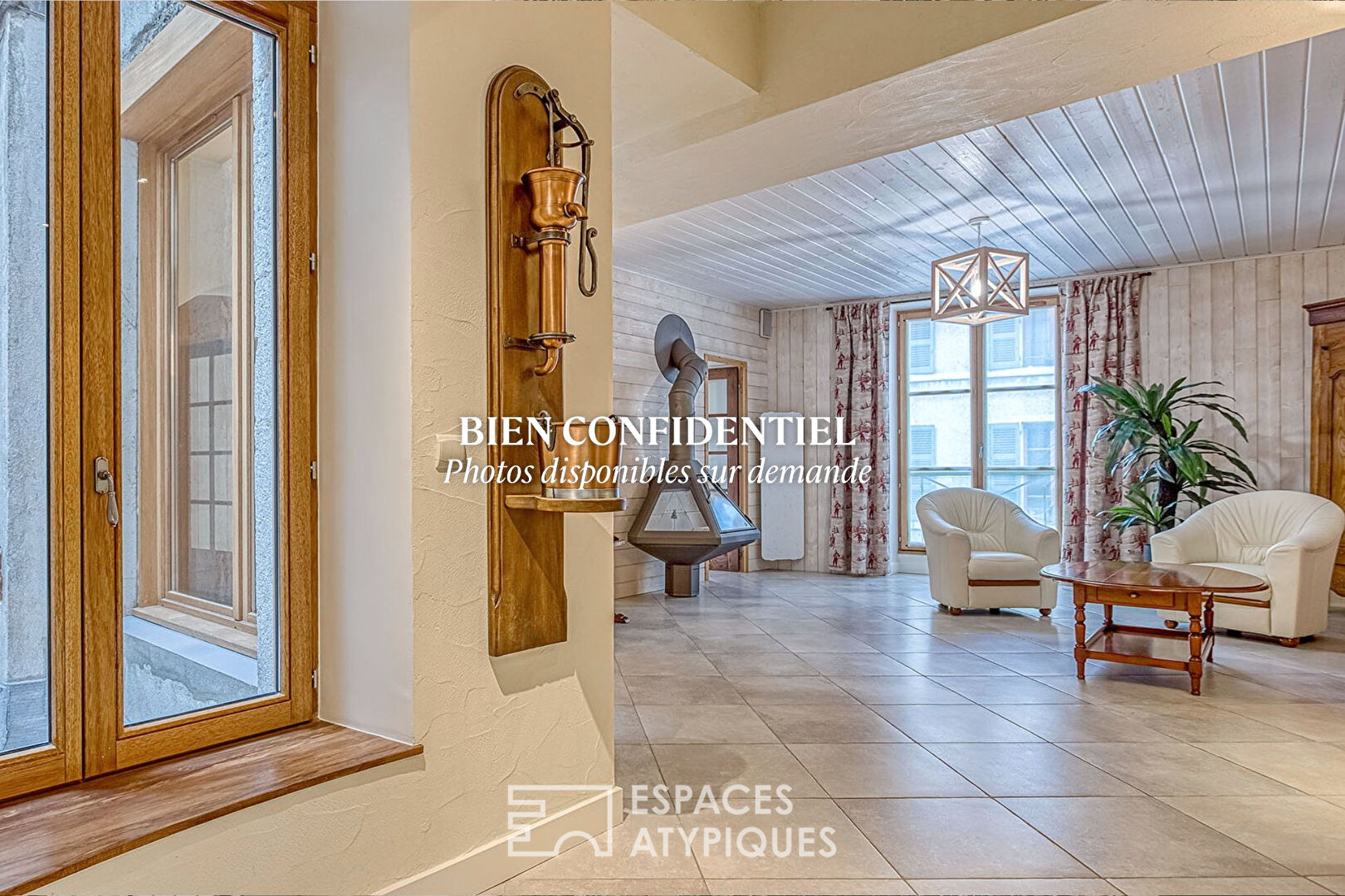 Renovated Apartment with Beautiful Volumes in the City Center