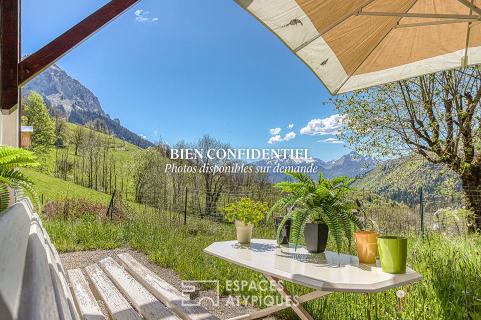 Bel appartement avec jardin et vue sur les montagnes