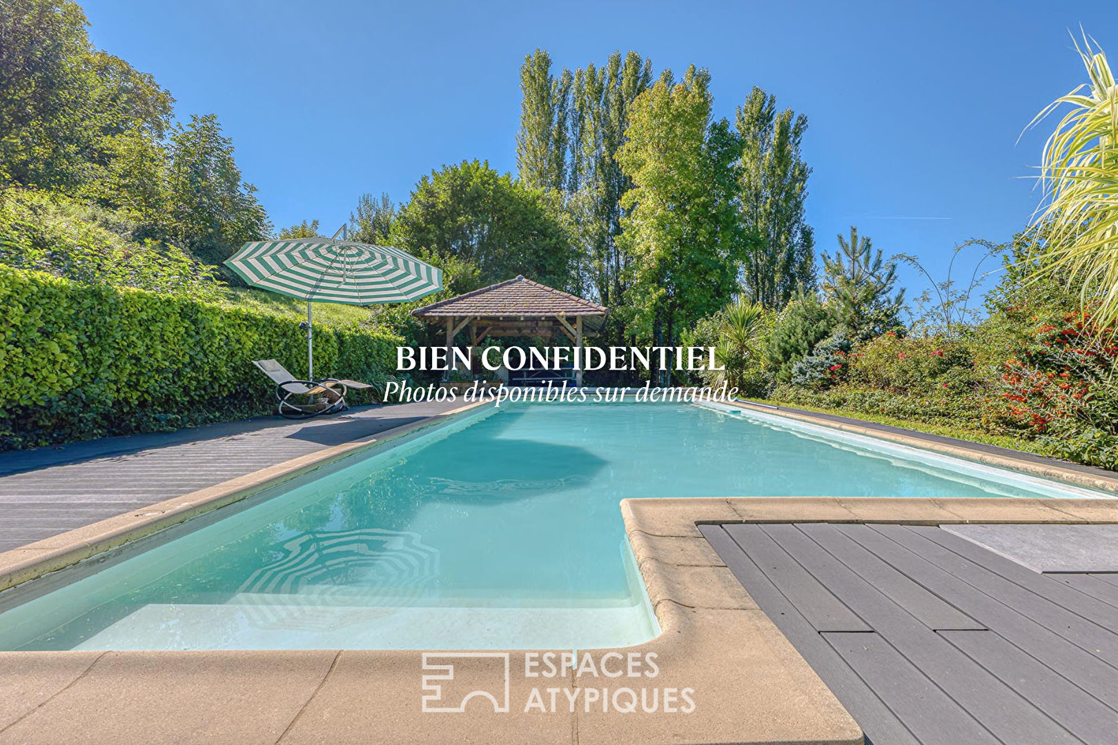 Architect-designed house with swimming pool and view