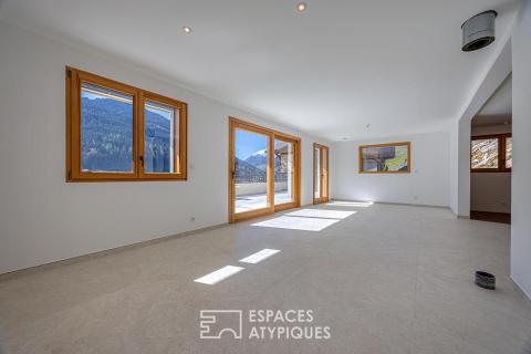Chalet passif avec terrasse panoramique et vue montagnes