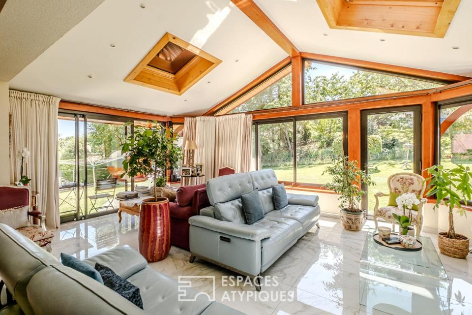 Villa familiale au coeur d'un environnement arboré