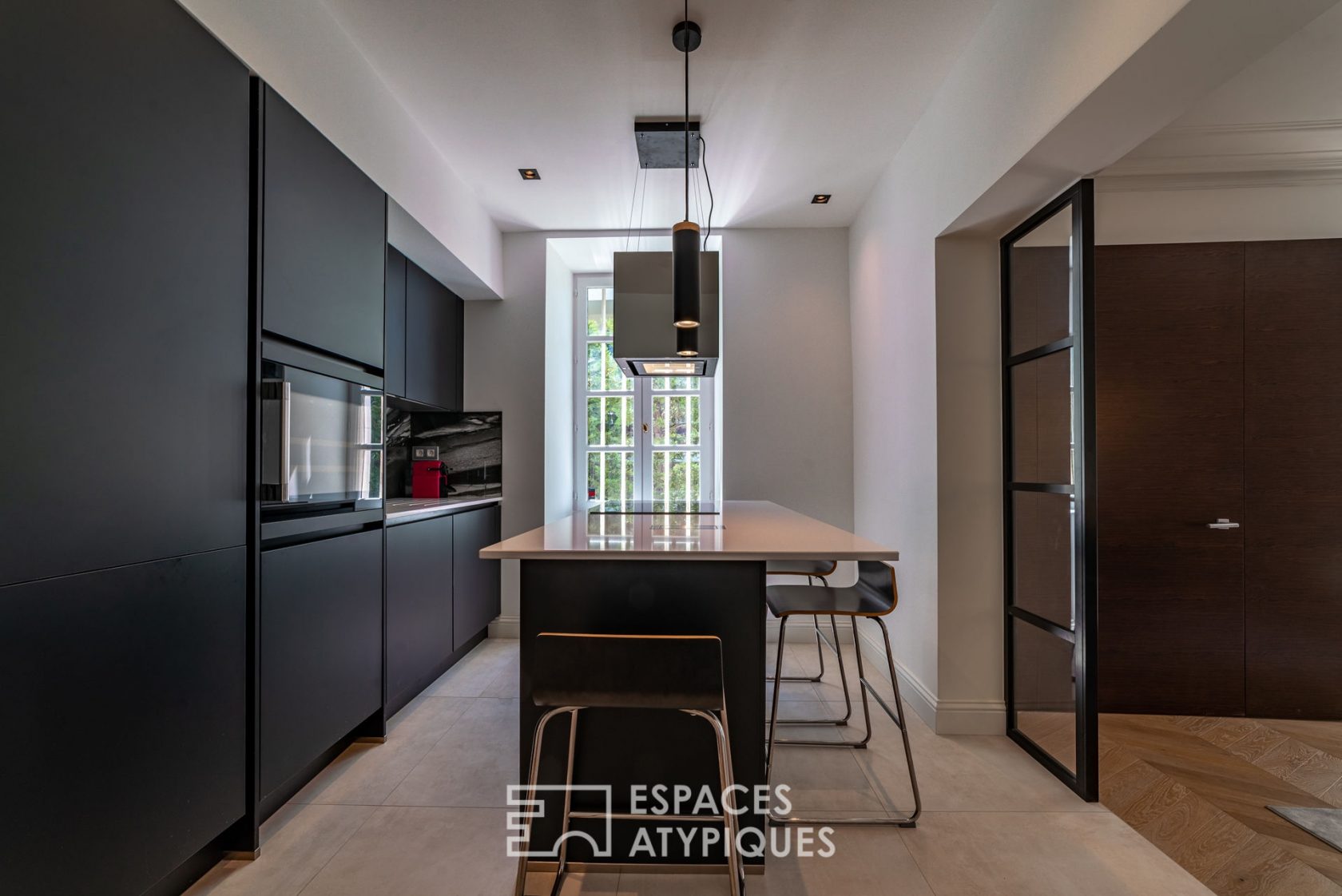 Duplex d’exception en rez-de-jardin d’un château