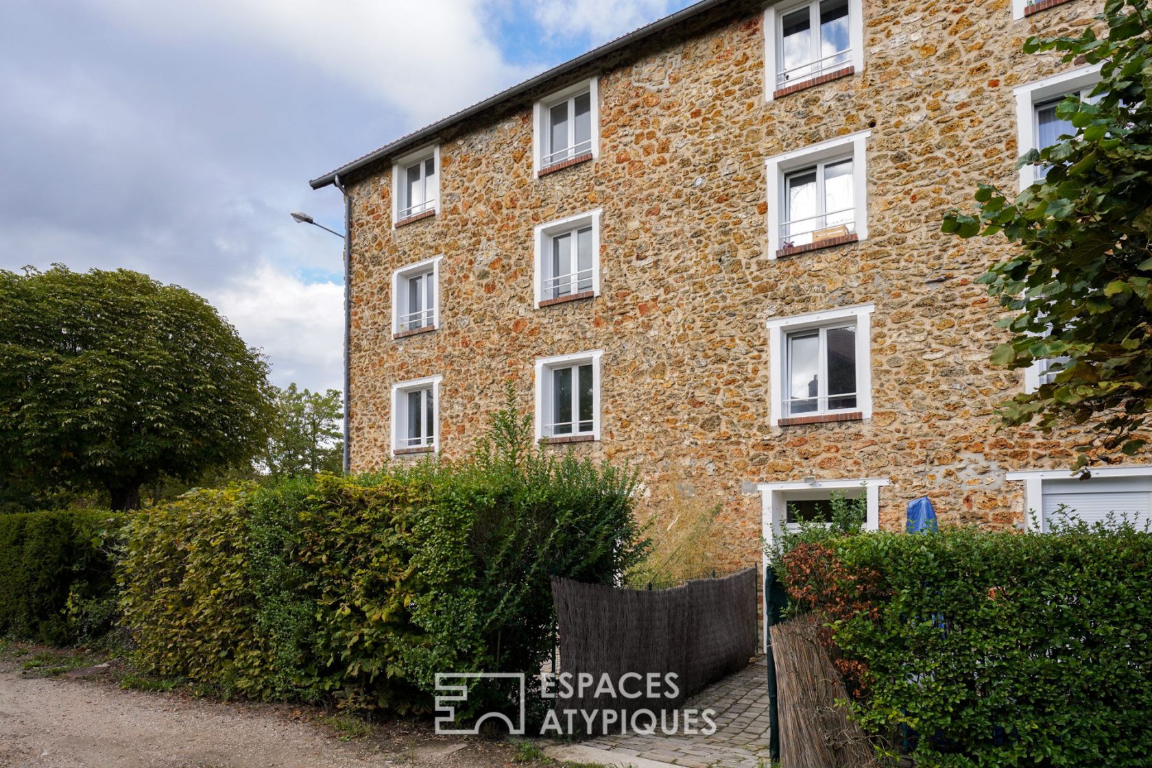 Appartement esprit loft dans un ancien moulin