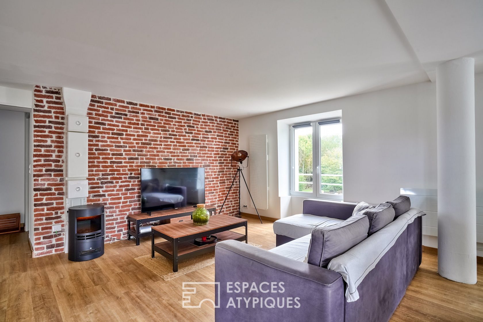 Appartement esprit loft dans un ancien moulin