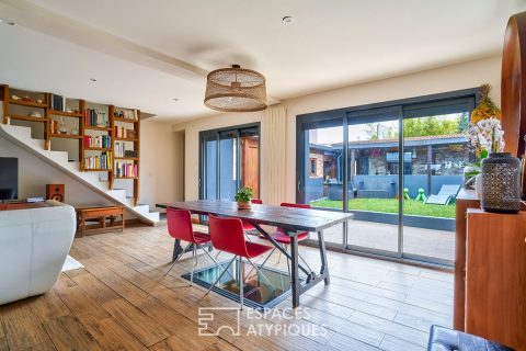 House with a cozy chic atmosphere and its intimate garden.