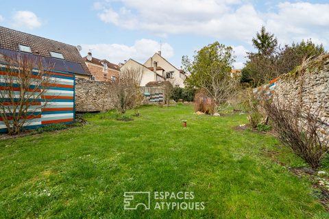 Maison de village aux multiples possibilités et son jardin suspendu