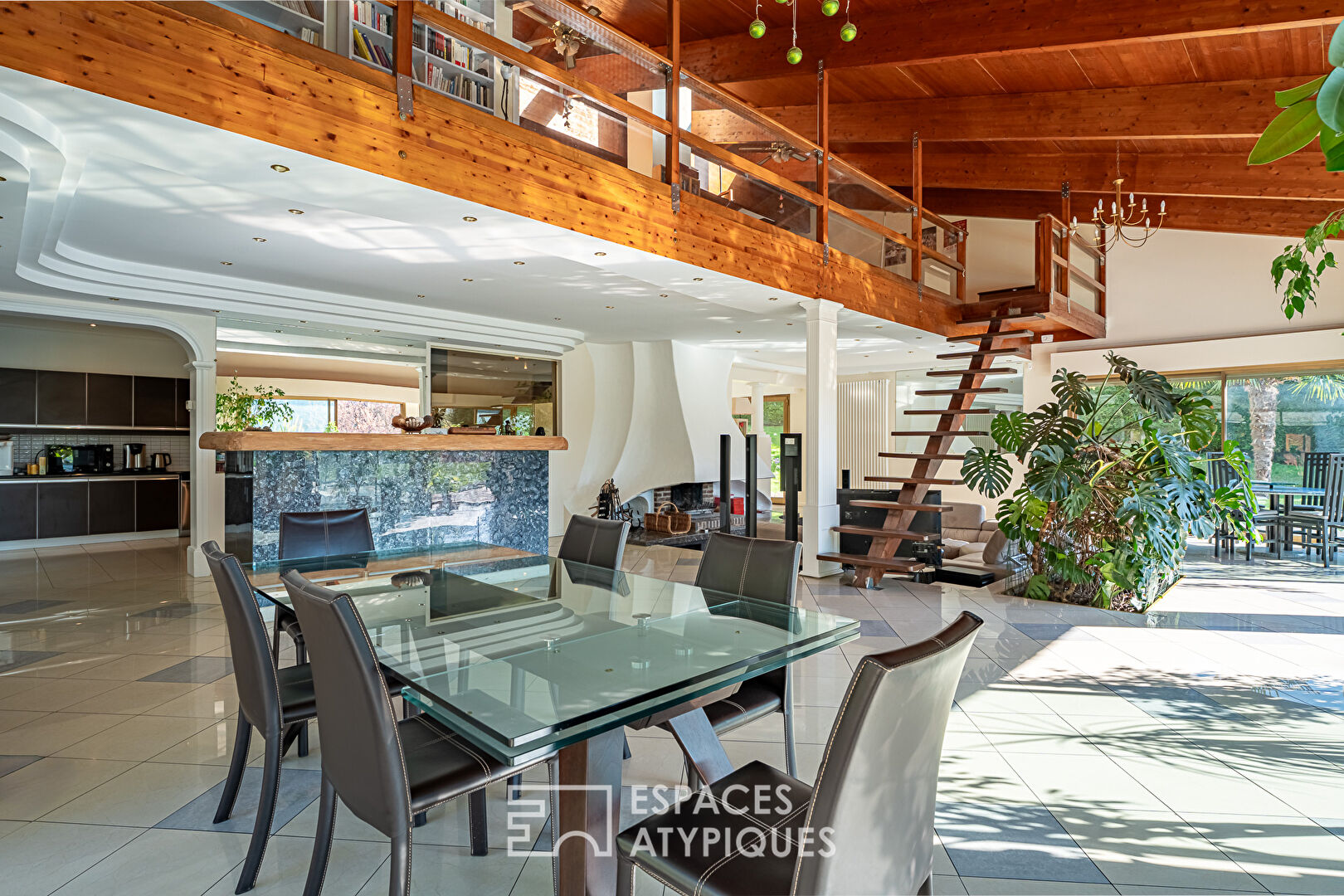 Multifaceted architect-designed house with open views, swimming pool and outbuildings