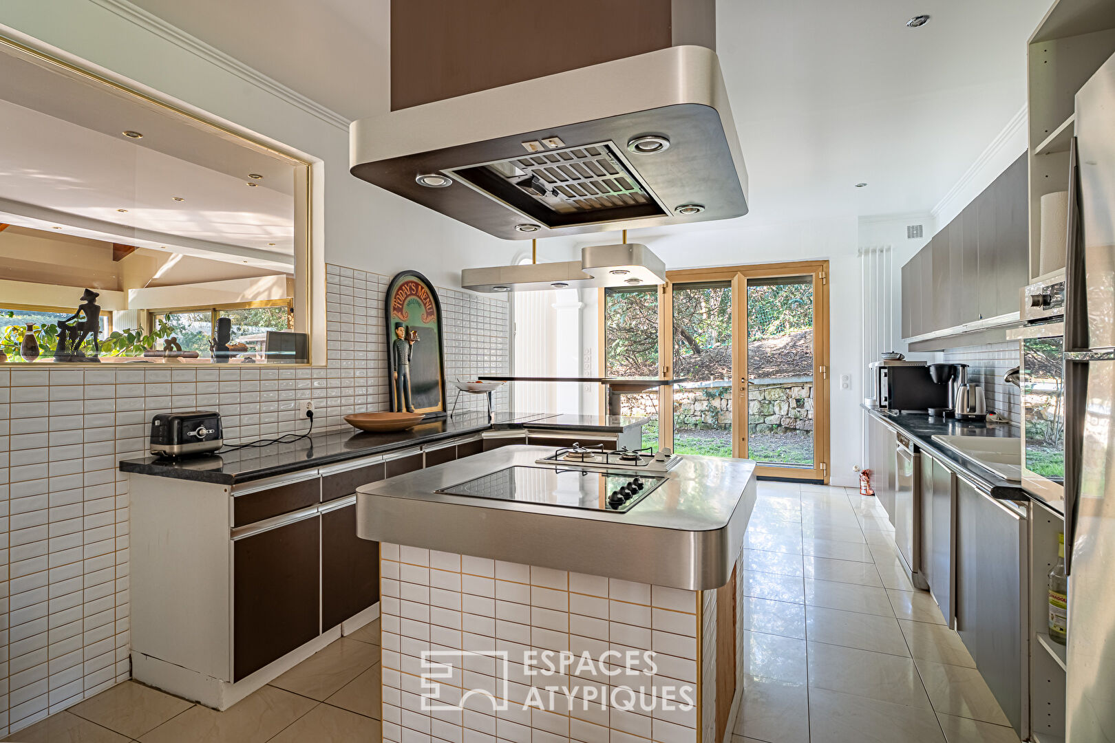 Multifaceted architect-designed house with open views, swimming pool and outbuildings