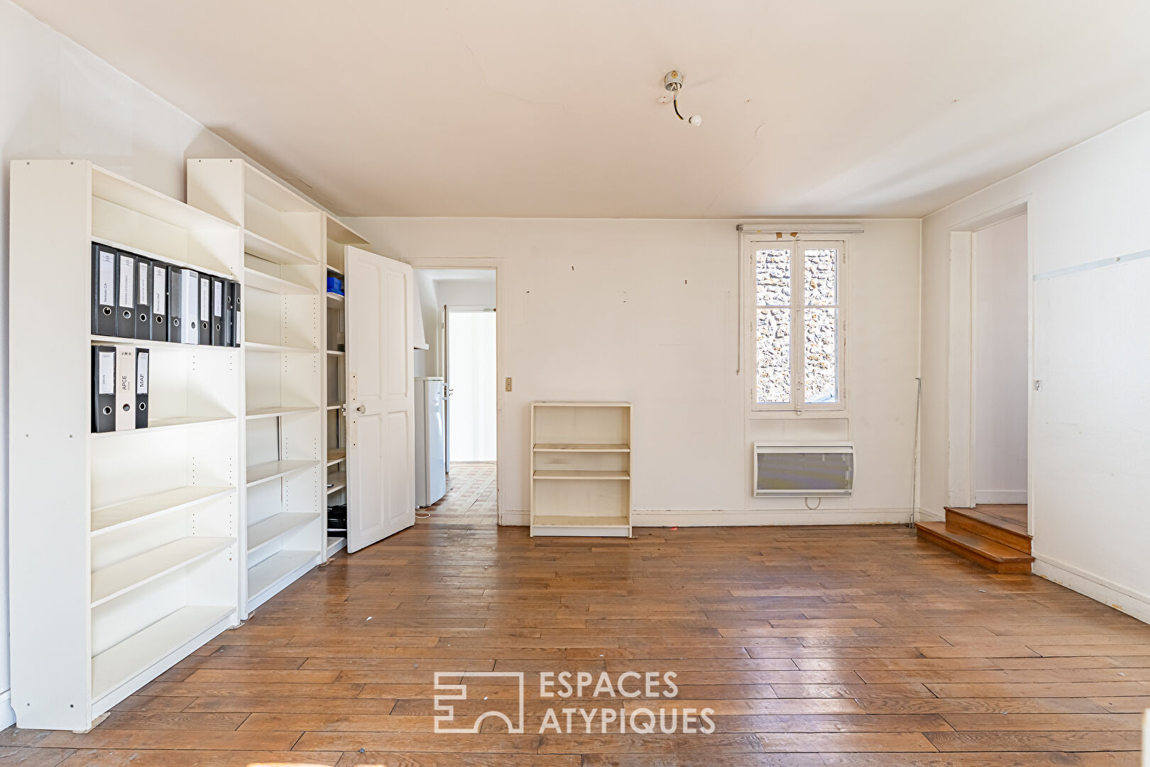 House with its exceptional loft and garden in the heart of Versailles