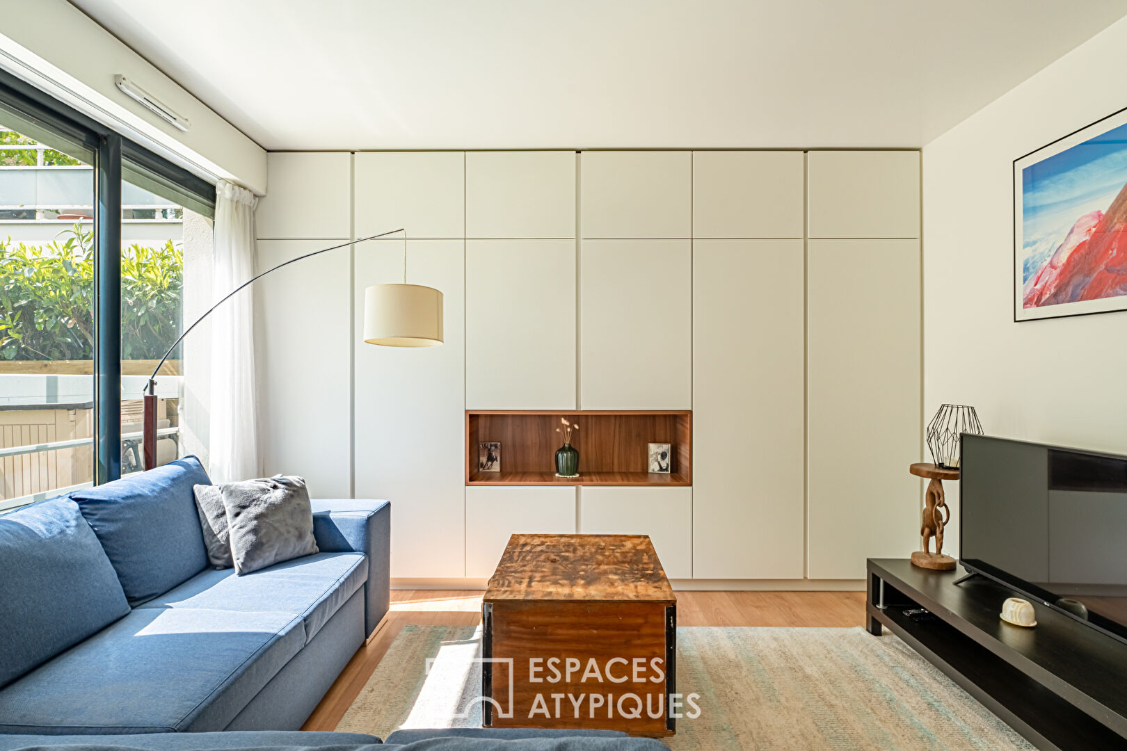 Appartement de trois chambres rénové avec goût, exposé sud avec jardinet