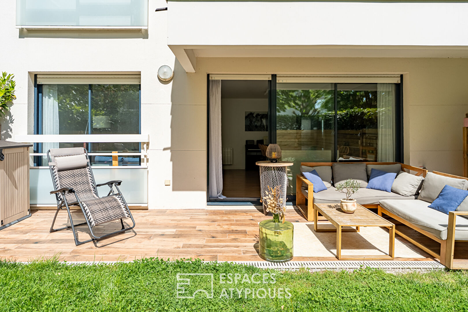 Appartement de trois chambres rénové avec goût, exposé sud avec jardinet