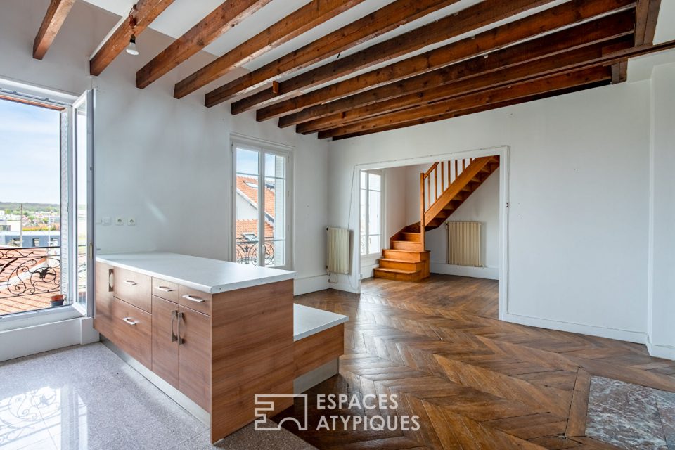 Duplex atypique en dernier étage