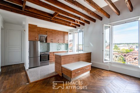 Duplex atypique en dernier étage