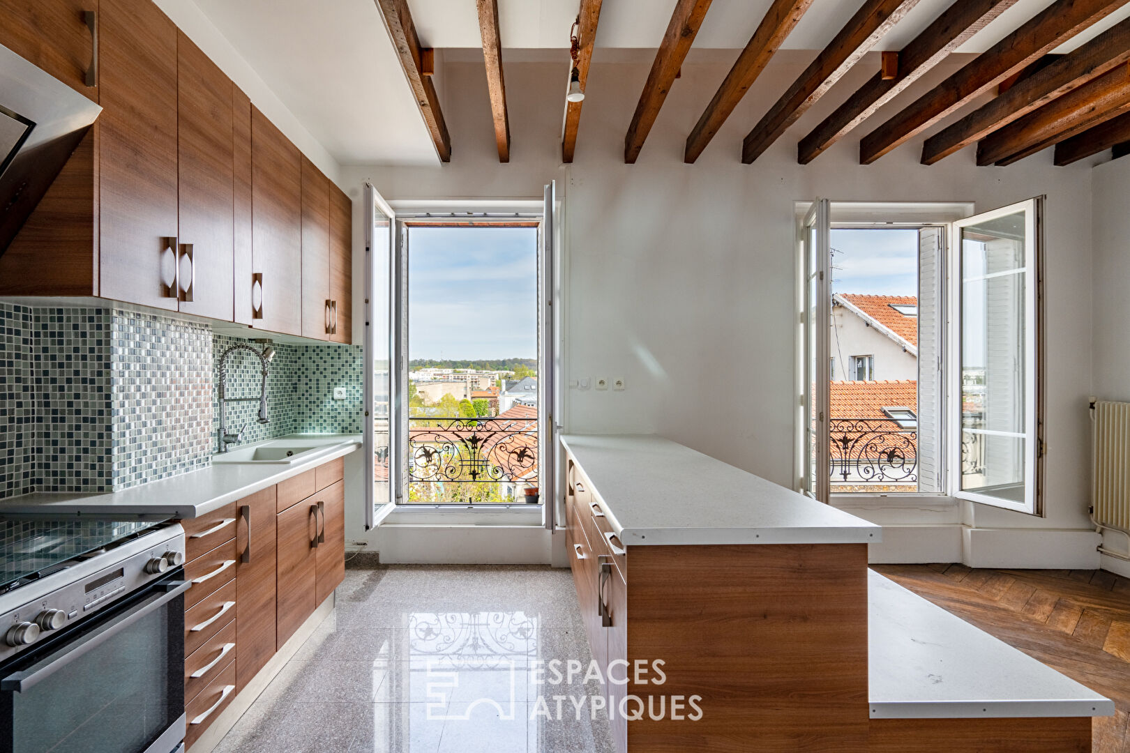 Duplex atypique en dernier étage