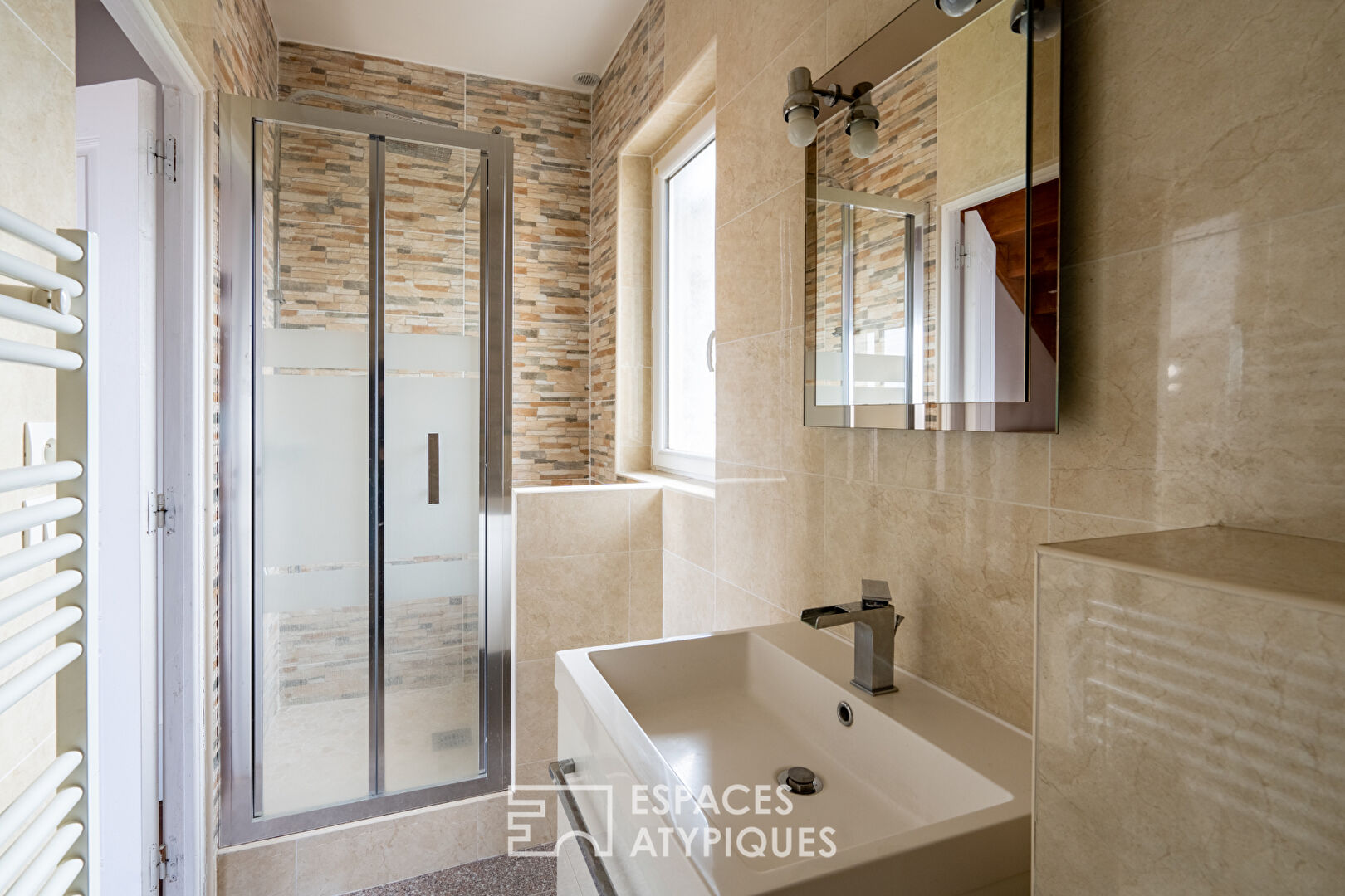 Duplex atypique en dernier étage