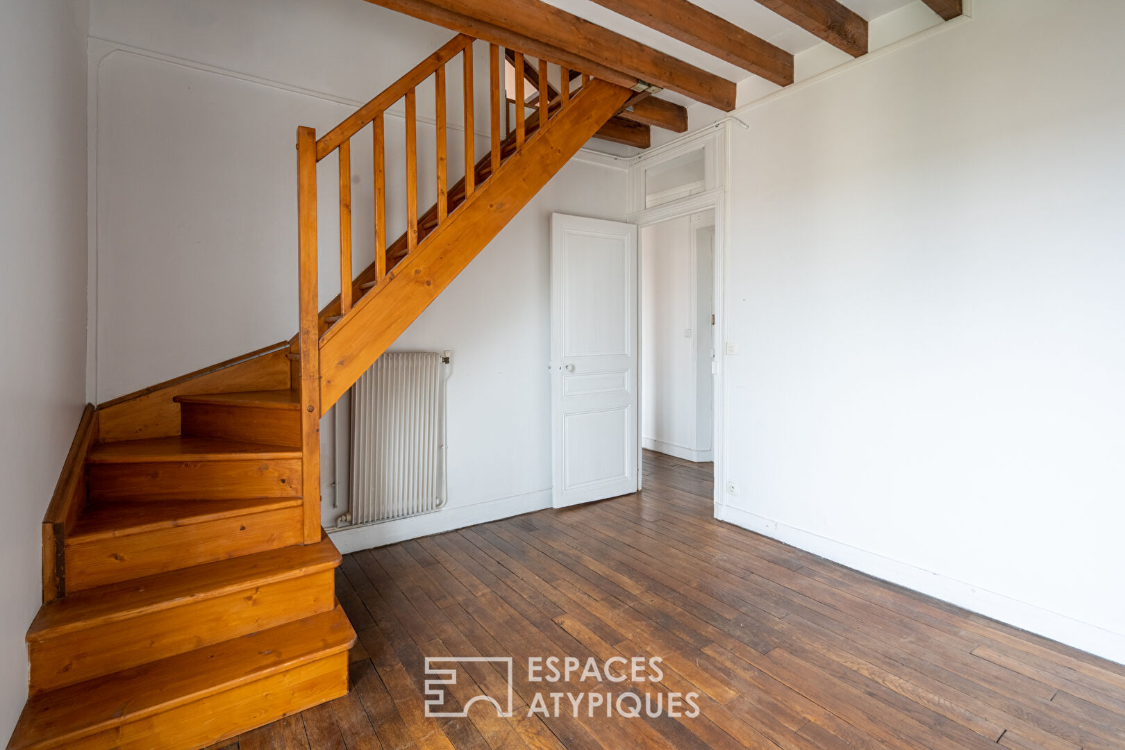 Duplex atypique en dernier étage