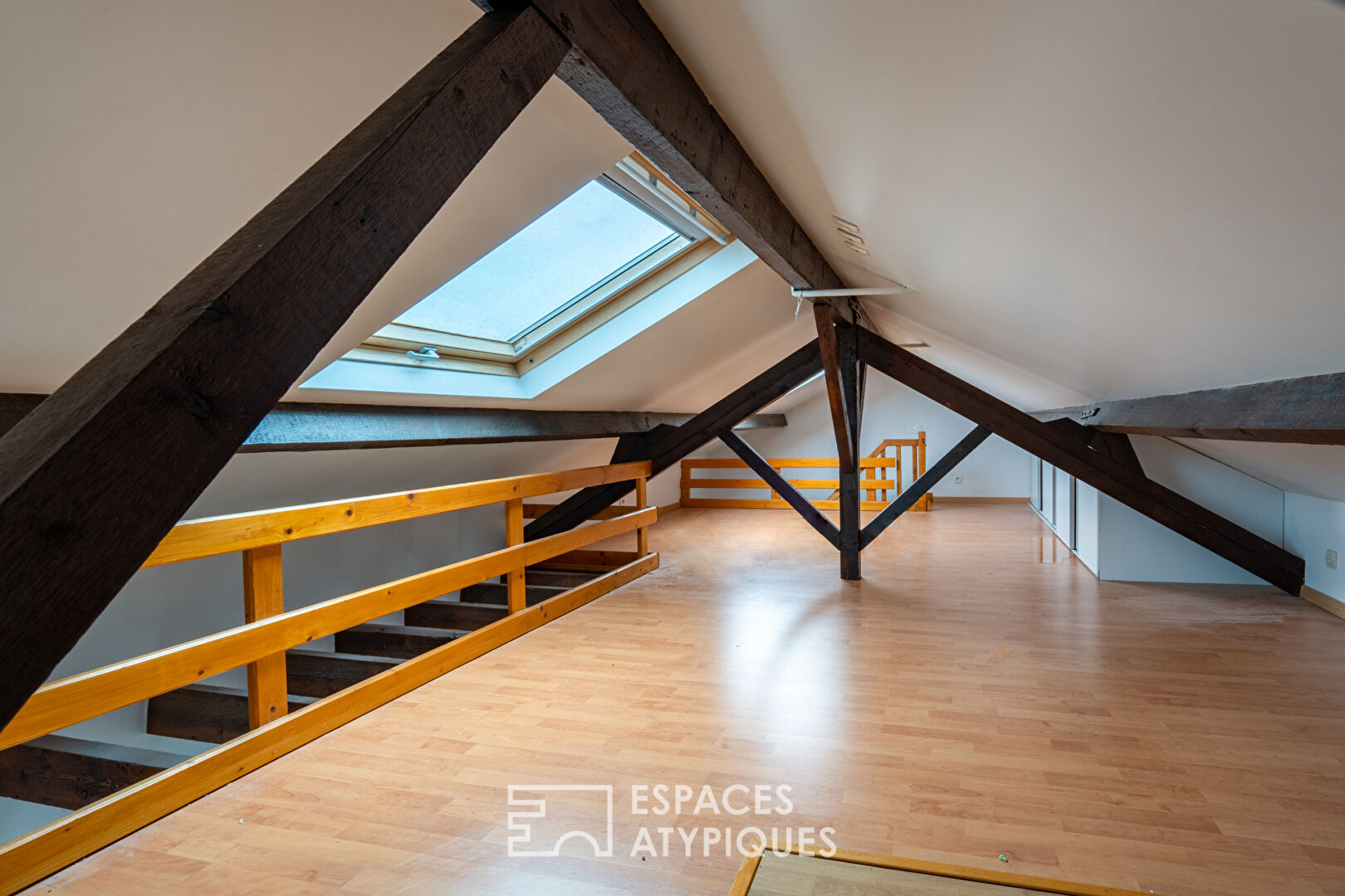 Duplex atypique en dernier étage