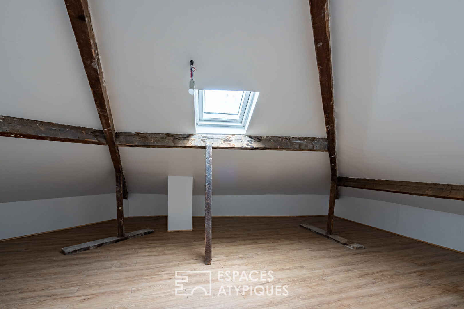 Duplex atypique en dernier étage