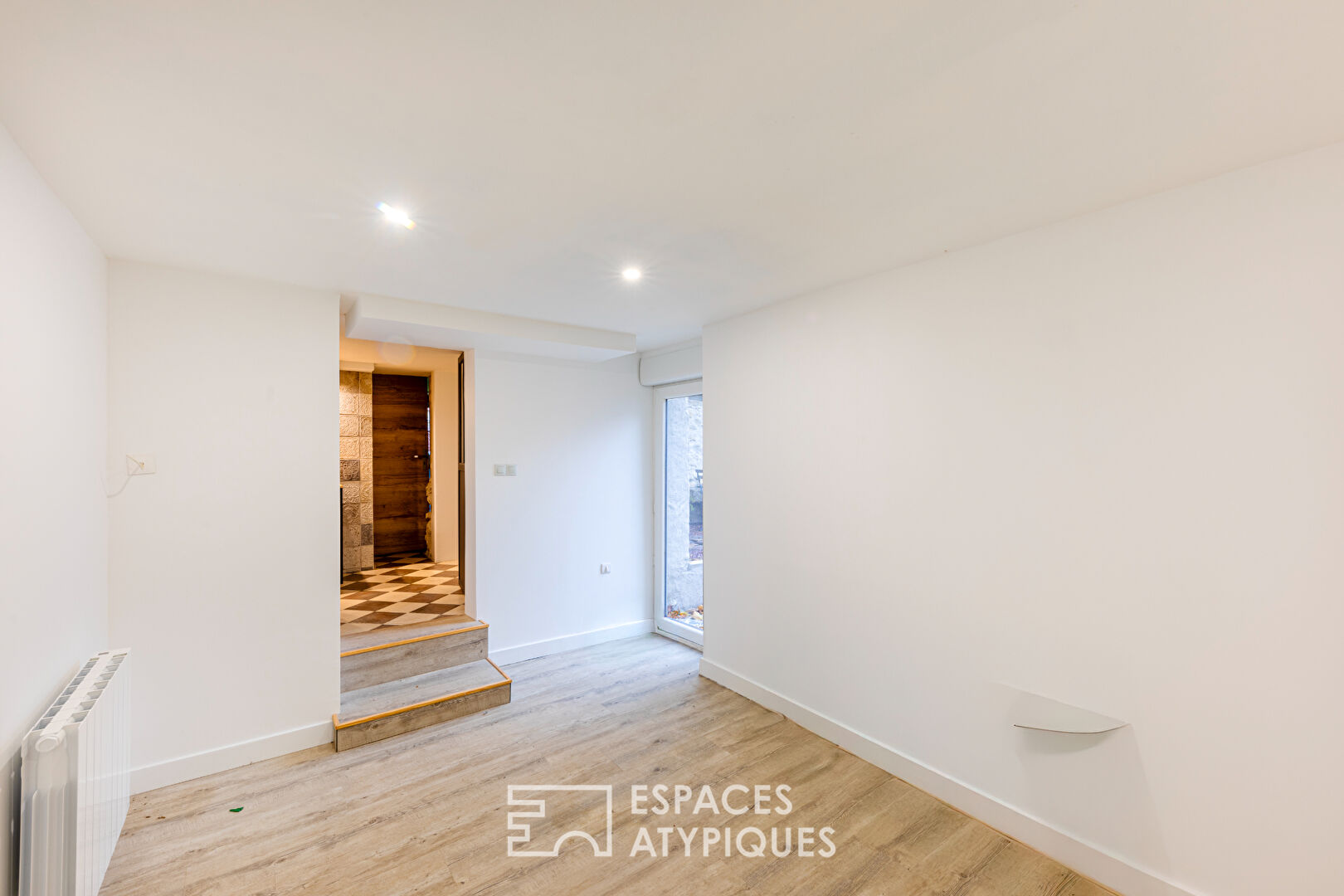 Maison de village de caractère et son atelier indépendant au coeur de Bouafle