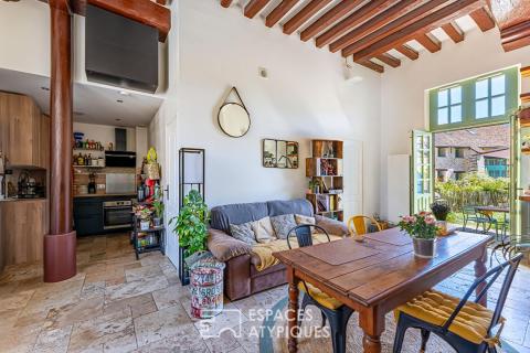 Appartement de caractère avec jardin, au coeur d&rsquo;un village préservé