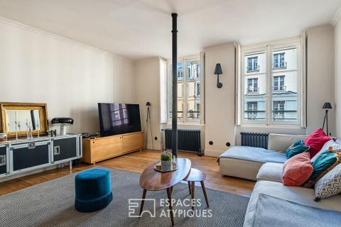 Open-plan spaces and a timeless charm: a Versailles-style loft.