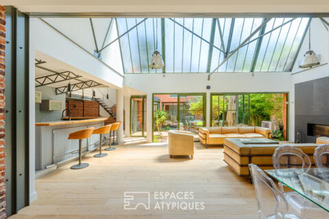 Former press warehouses converted into single-story lofts with patios
