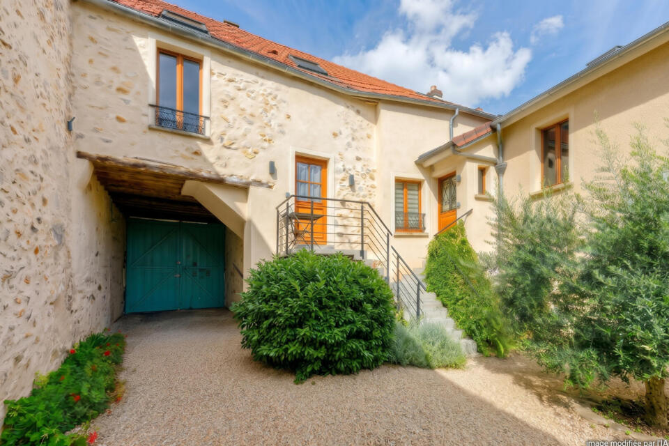 Maison de caractère issue d'un corps de ferme rénové avec jardin à Evecquemont dans le Vexin français