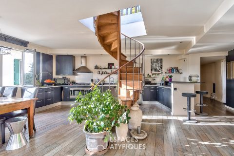 Appartement contemporain avec toit-terrasse et vue