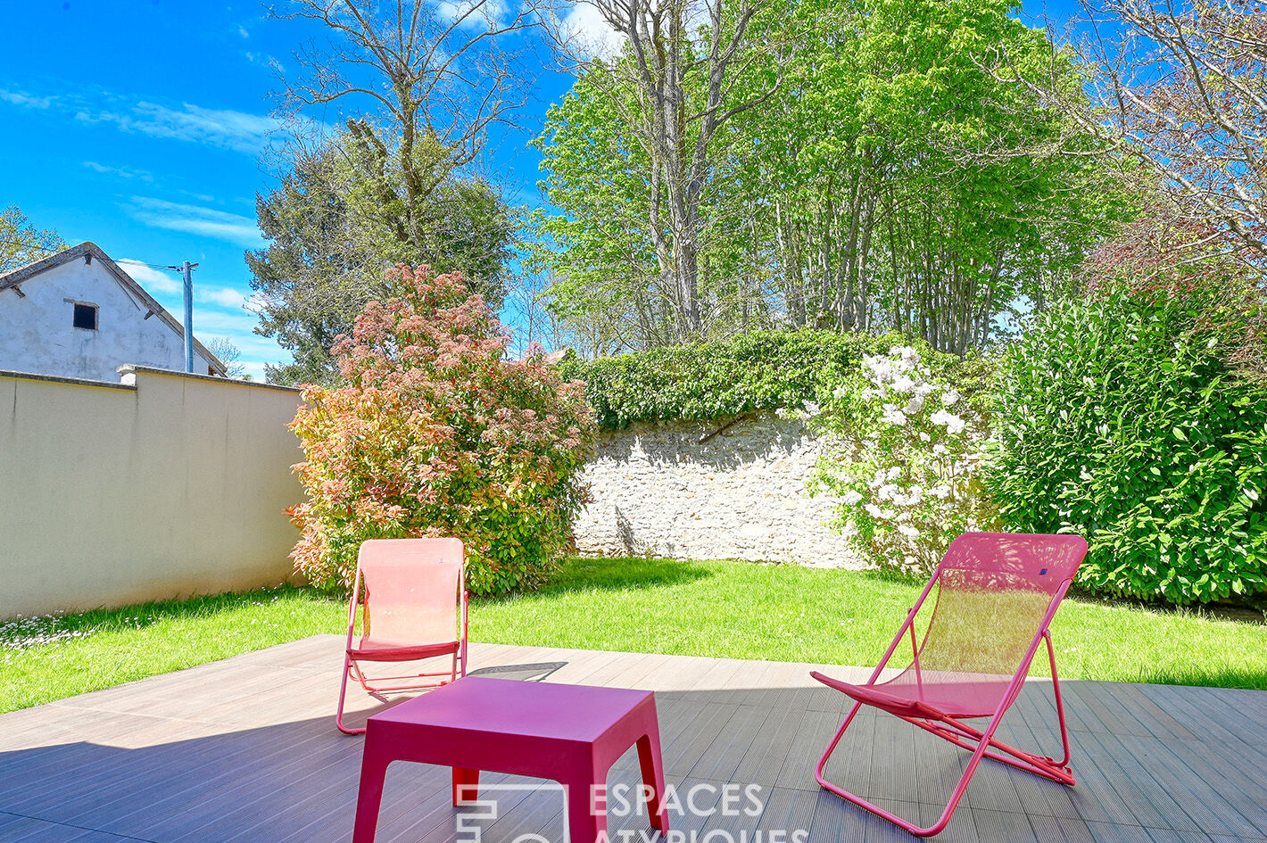 Architect-designed house with garden in a charming village.