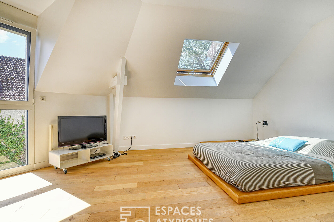 Architect-designed house with garden in a charming village.
