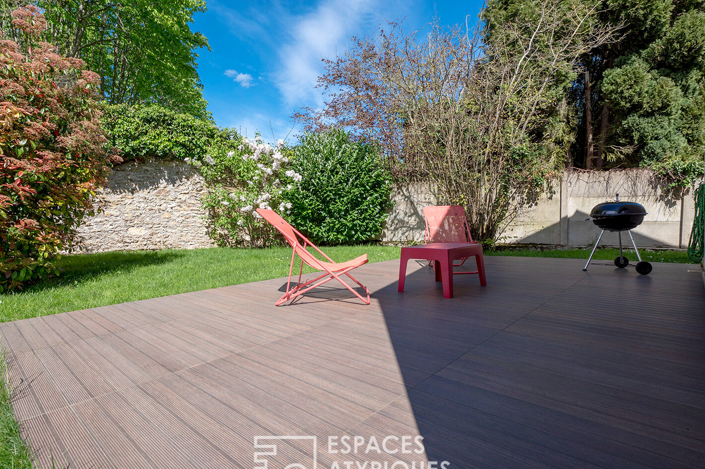 Architect-designed house with garden in a charming village.