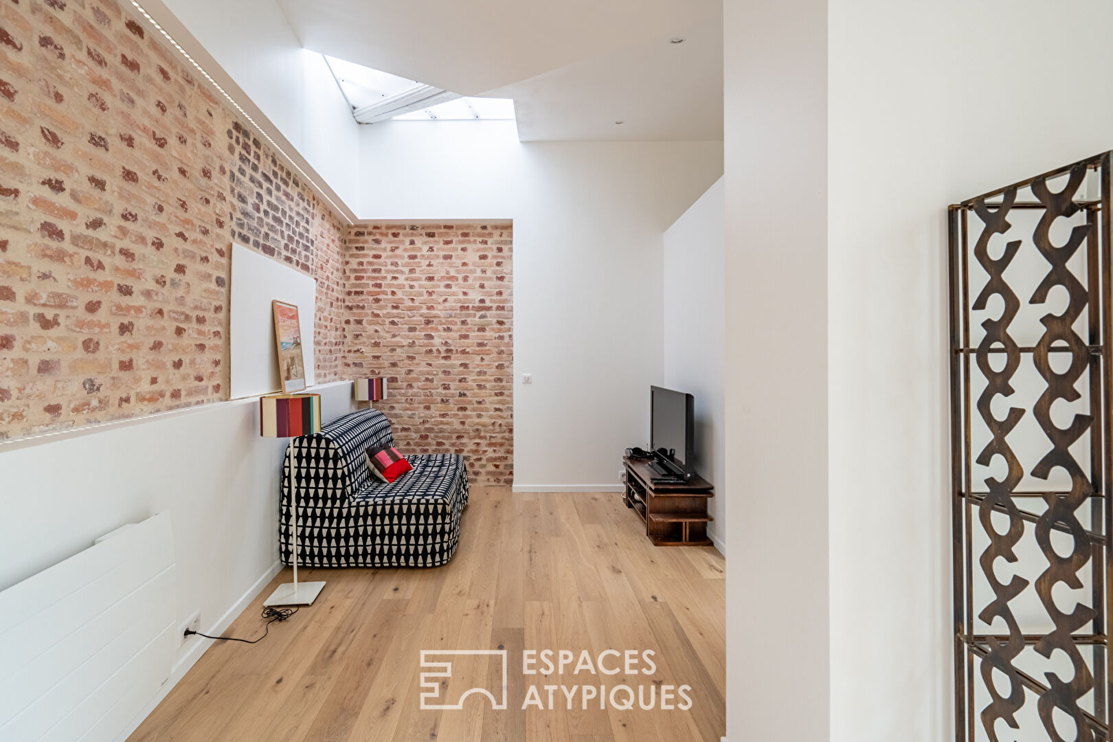Maison d’architecte à la toiture papillon avec vue