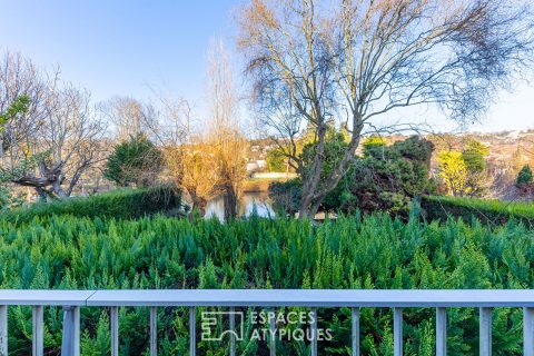 Maison familiale sur une île privée en bord de Seine