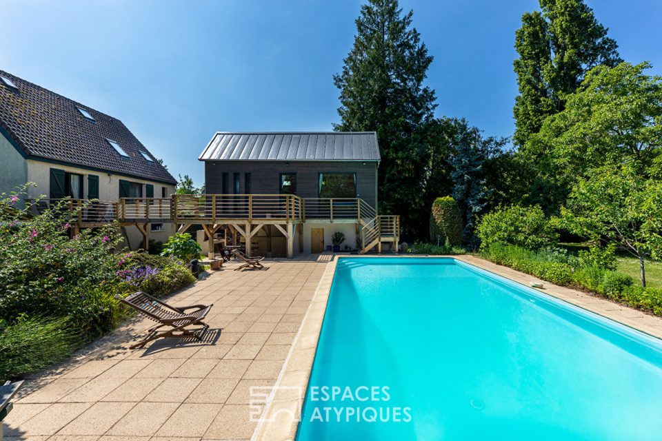 Maison sur île privée avec dépendance d'architecte, piscine et ponton privatif