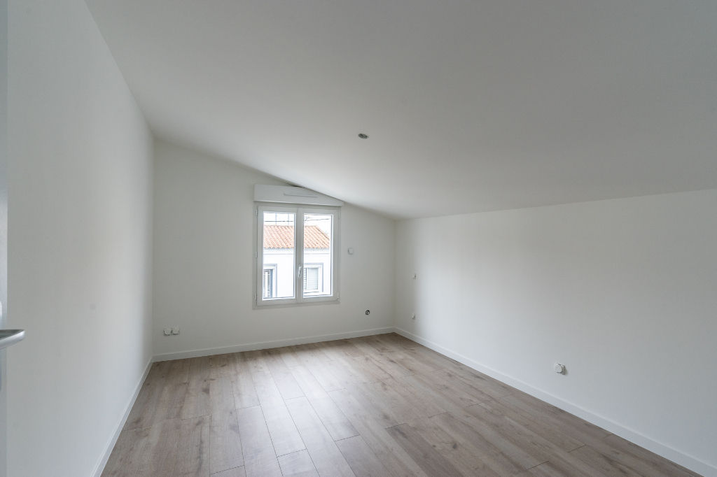 Maison de bourg entièrement rénovée avec son jardin intimiste