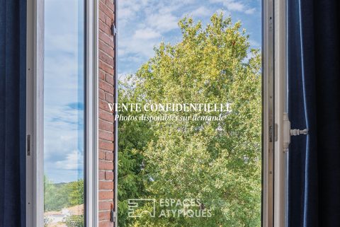 Élégante demeure du début XXe rénovée avec double garage dans le bourg