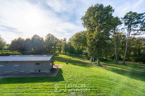 Maison familiale aux grands volumes et son jardin arboré