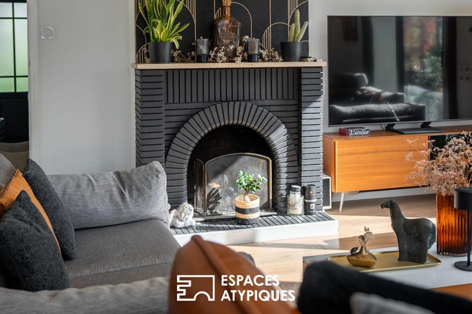 Maison de famille revisitée : Éclat contemporain et écrin de verdure à Carquefou