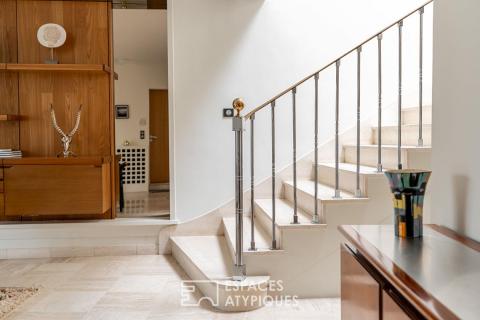 Maison d&rsquo;architecte, jardin paysager et perspectives sur la Sèvre