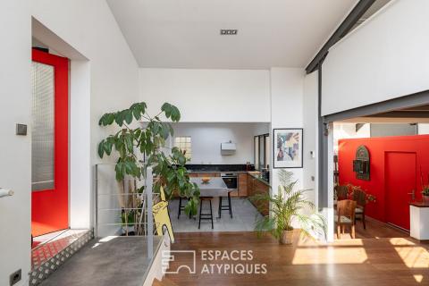 Superbe loft lové dans une ancienne fabrique de Vitrail .