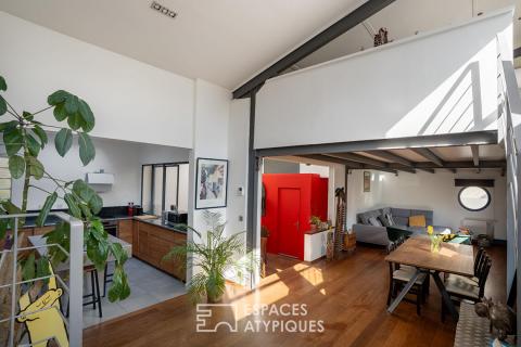 Superbe loft lové dans une ancienne fabrique de Vitrail .