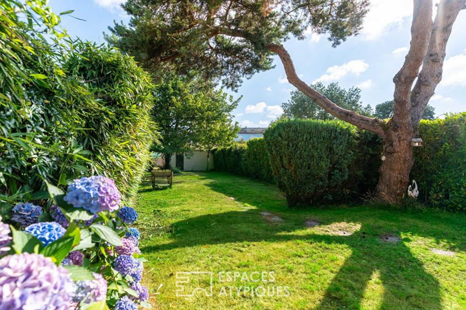 Basse-Indre : Charmante maison des années 30 au séjour cathédrale et joli jardin