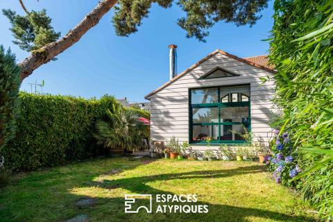 Basse-Indre : Charmante maison des années 30 au séjour cathédrale et joli jardin