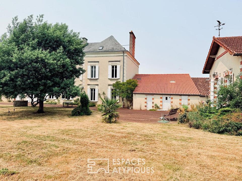Maison de maître et dépendances dans un écrin de nature préservé