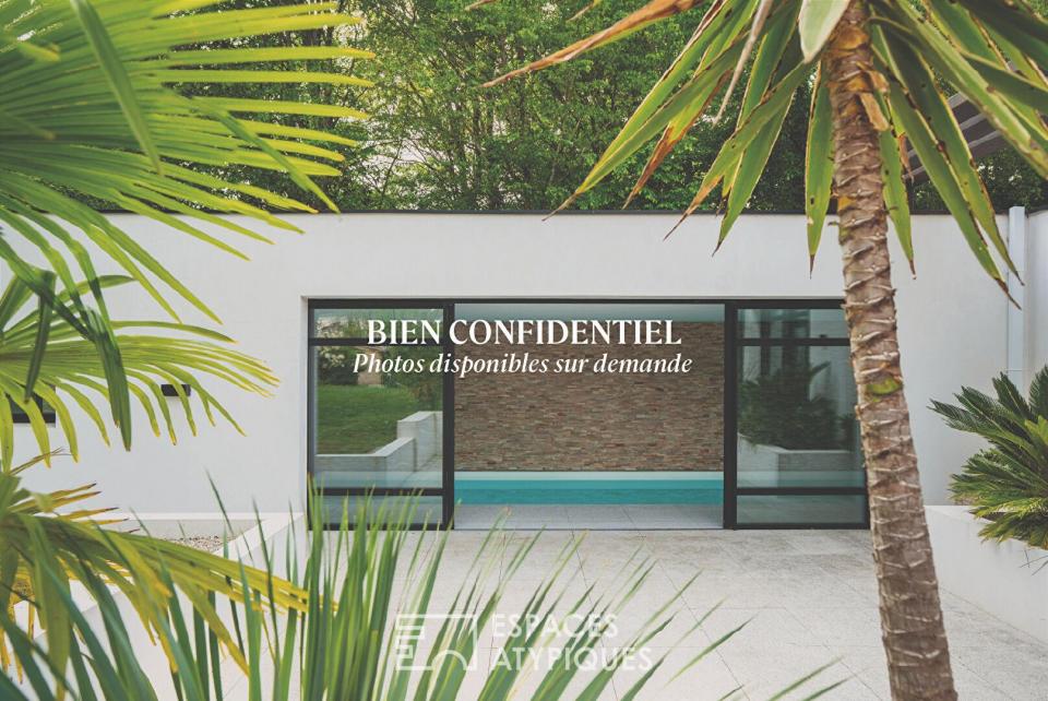Maison contemporaine avec piscine intérieure, terrasse Sud et prestations haut de gamme
