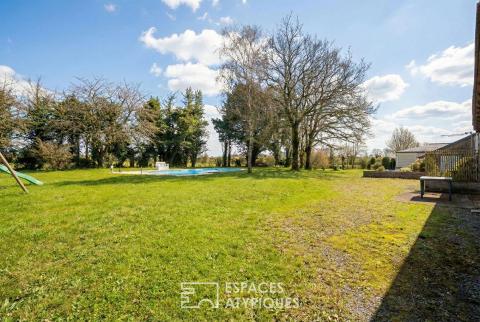 Maison d&rsquo;hotes dans son écrin de verdure avec piscine