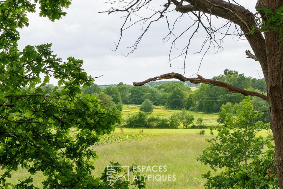 Belle parcelle avec panorama à 360° et ancien moulin à vent