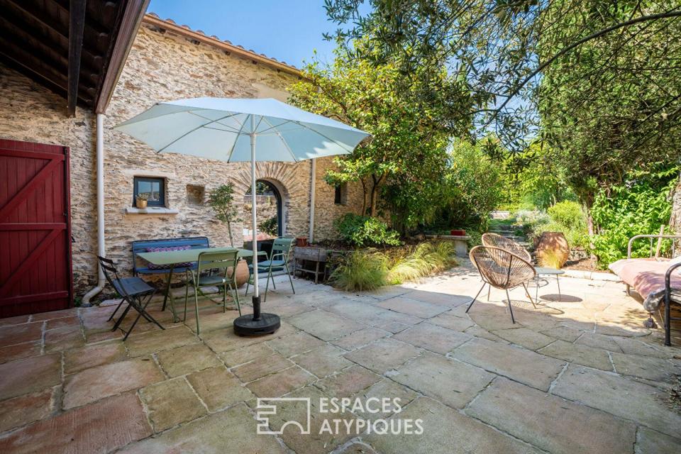 Grande maison de charme en ville sur son jardin méditerranéen