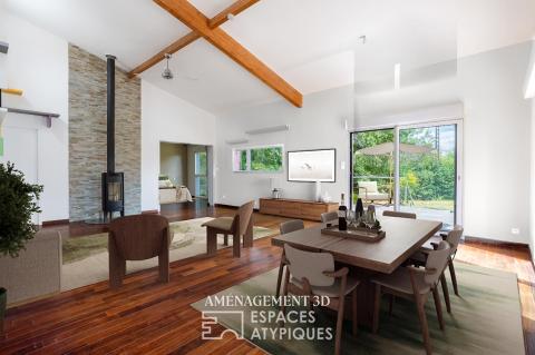 Maison en bois nichée dans un écrin au calme.