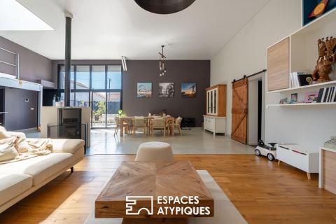 Loft design aux volumes généreux, proche de toutes les commodités